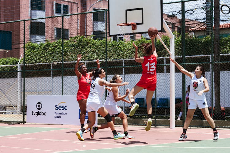 Young Women Playing Basketball