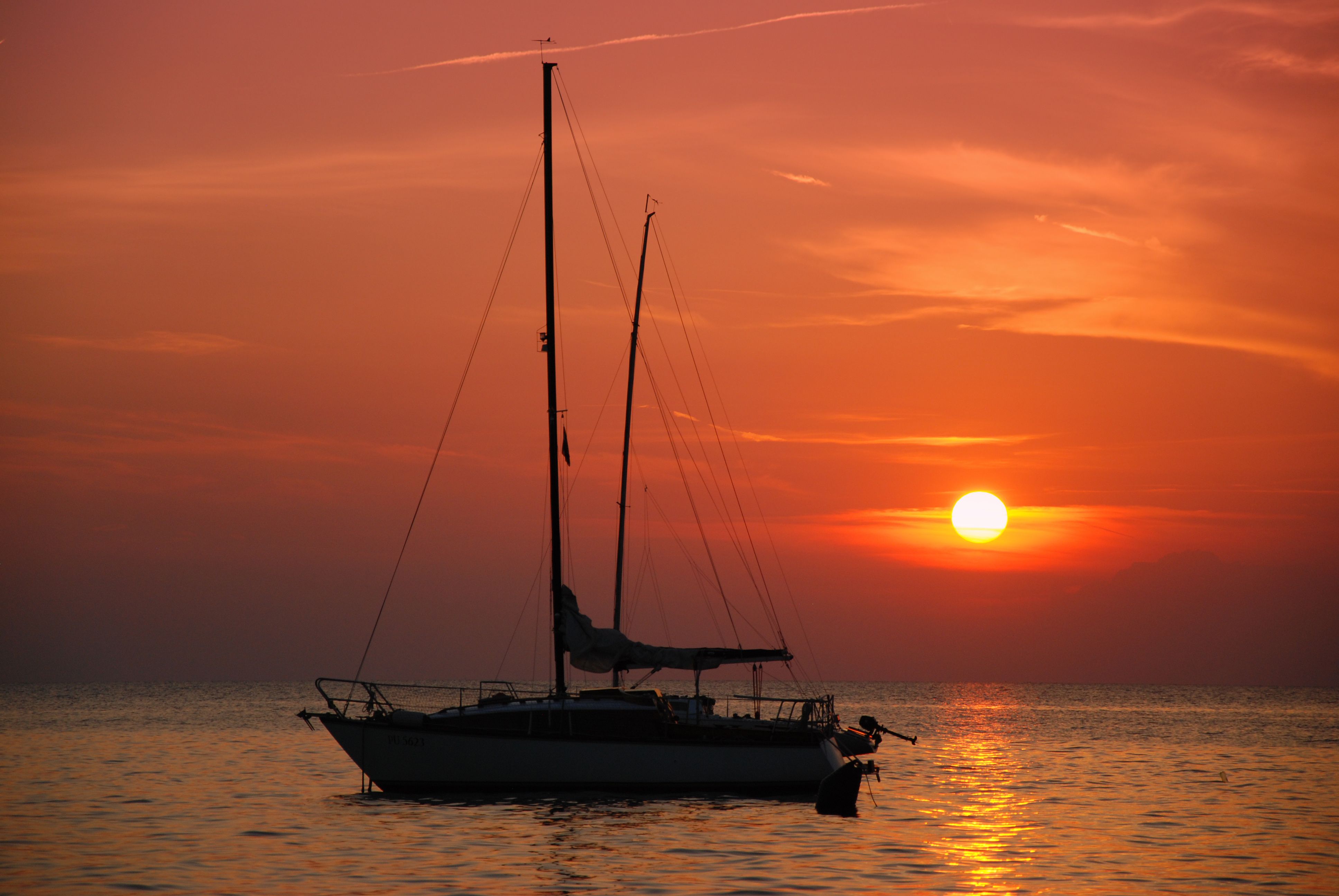 Sailboat On Body Of Water At Daytime · Free Stock Photo