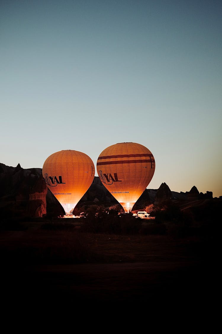 Hot Air Balloons On Ground At Dawn