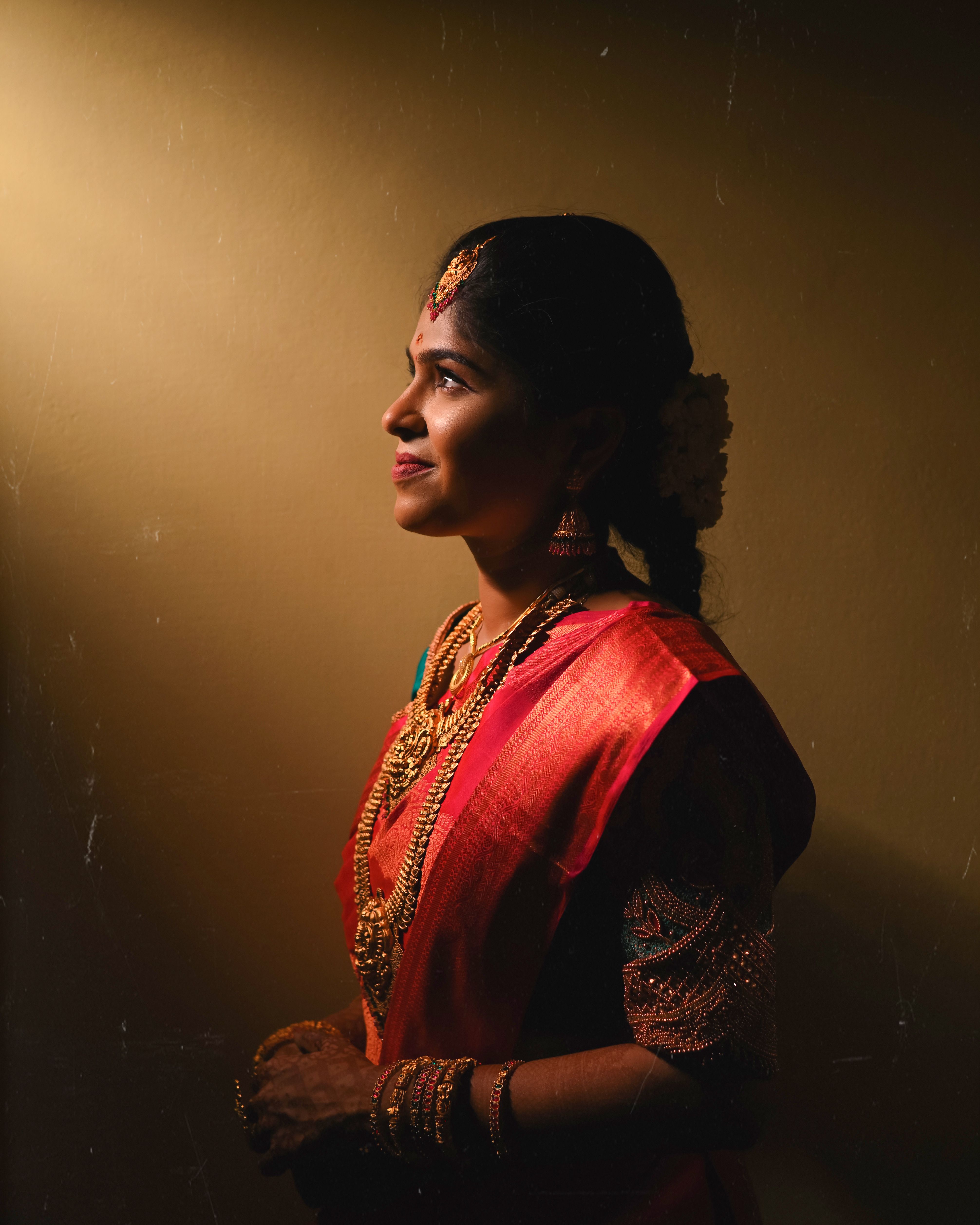 Young Woman in Red Traditional Saree and Jewelry · Free Stock Photo