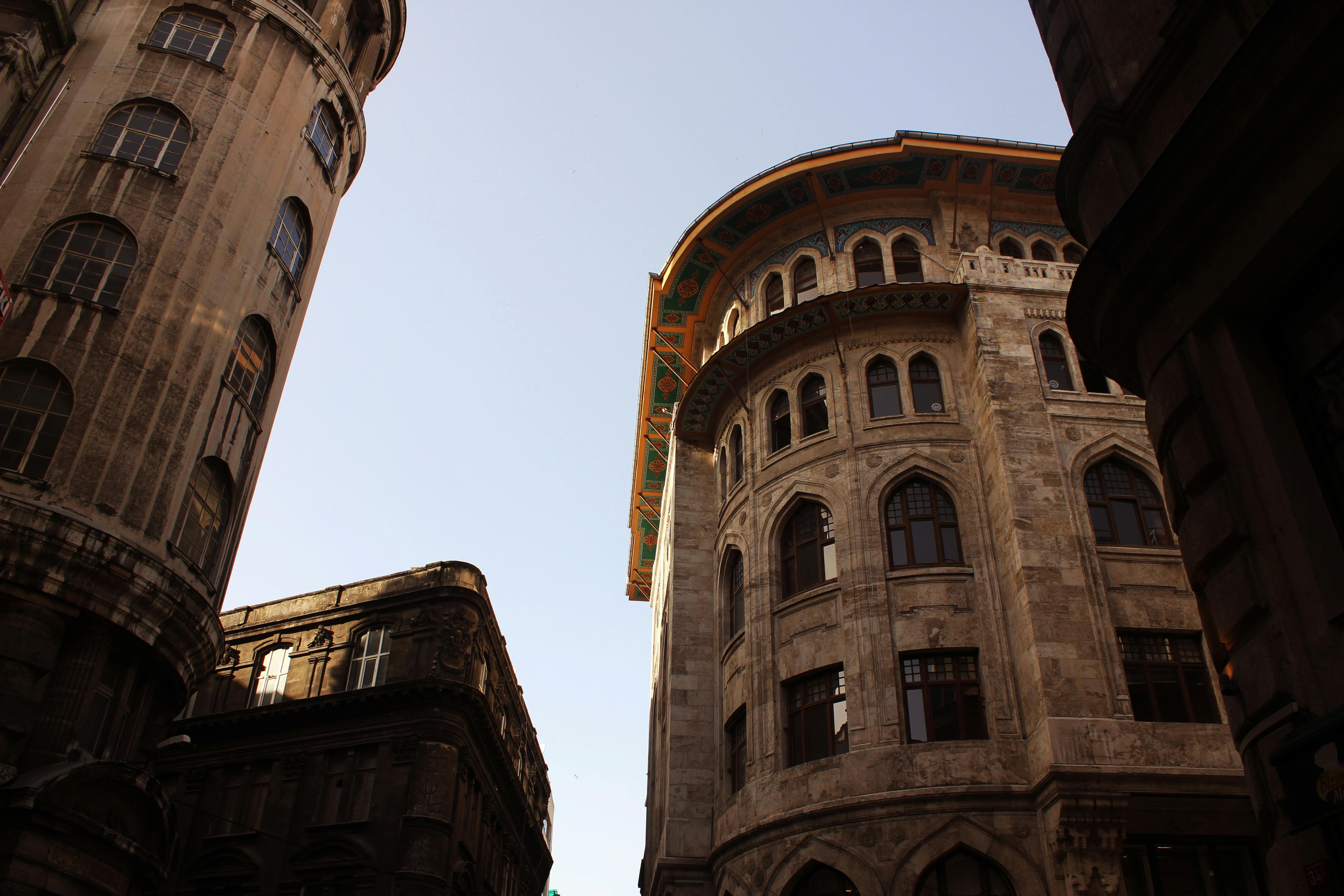 Historic buildings in Istanbul's Sirkeci district showcasing classic architecture under a clear sky.