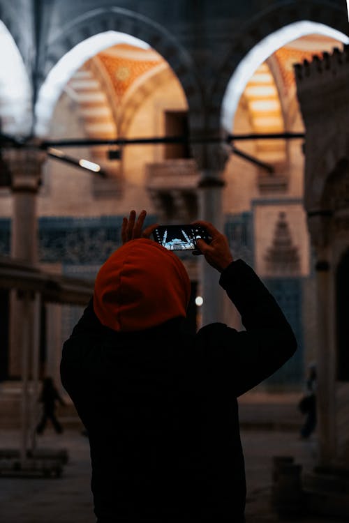 Gratis stockfoto met achteraanzicht, gebruik makend van, hoodie