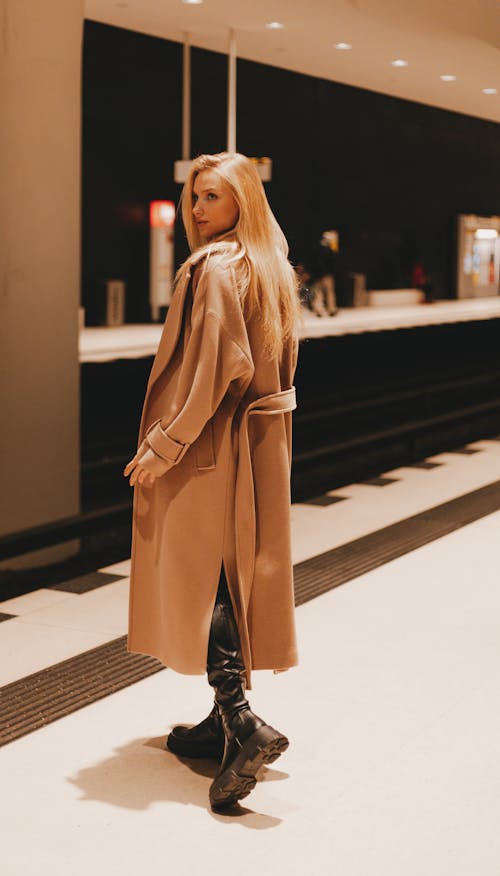 Blonde Woman in Coat and Boots