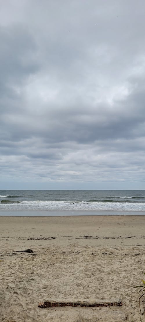 Foto profissional grátis de areia da praia, costa do oceano, mar aberto