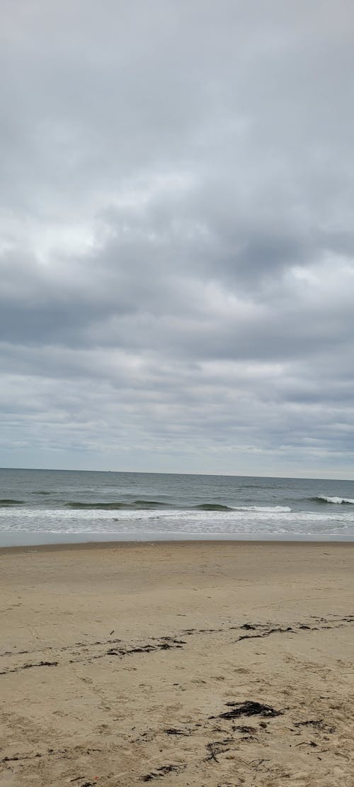 deniz okyanusu, kumlu plaj, Mavi su içeren Ücretsiz stok fotoğraf