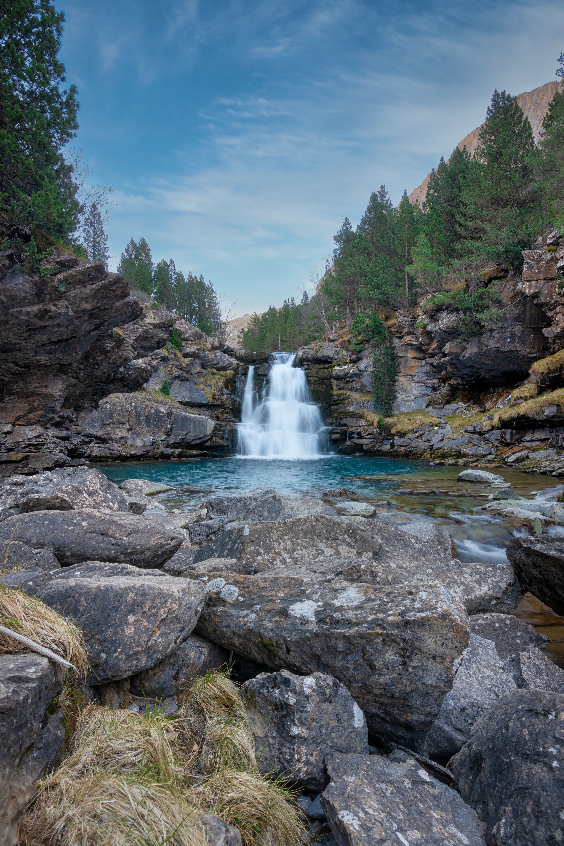 Mountain waterfall and rocky landscape in the Pyrenees, Huesca