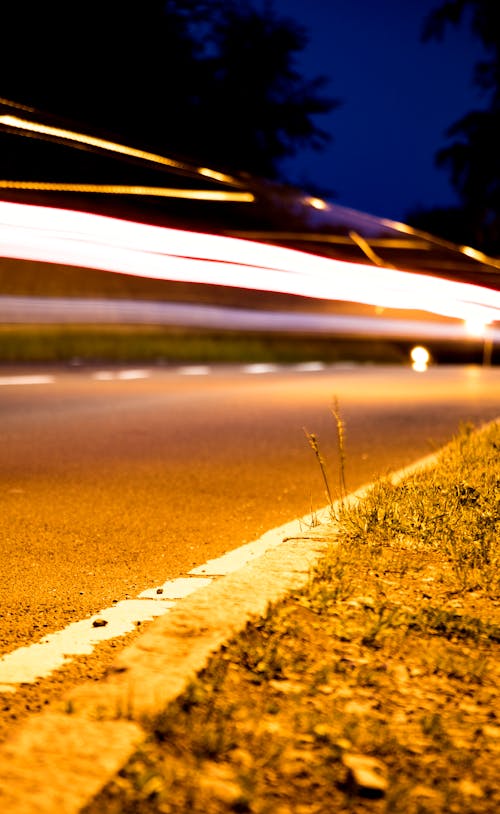 Foto profissional grátis de automóvel, calçamento, cena noturna