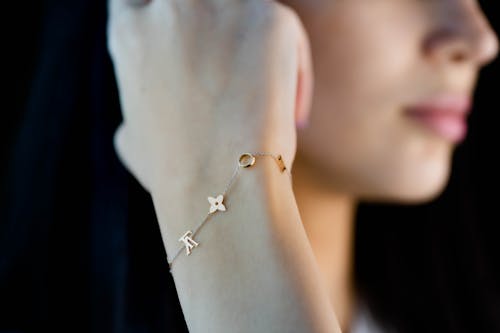 Golden Bracelet on Woman Hand