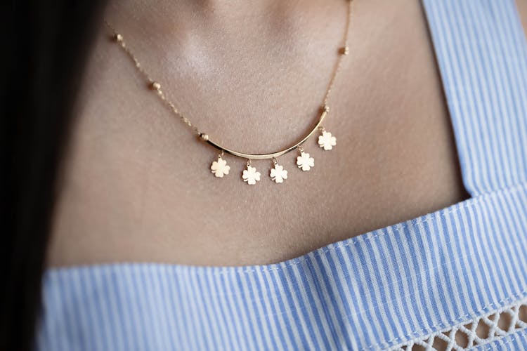 Close Up Of Woman With Golden Necklace