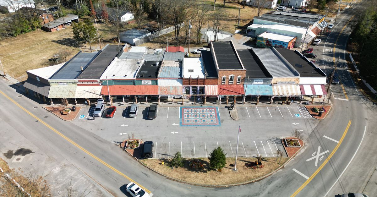 Explore charming downtown Bell Buckle with vintage shops and quiet streets from above.