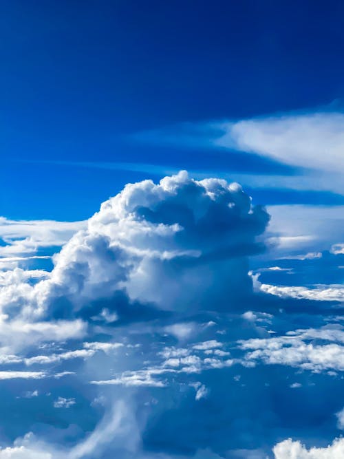 View of Cumulus Clouds and Blue Sky from Above 