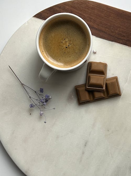 Free Cup of Coffee, Flowers and Chocolate Stock Photo