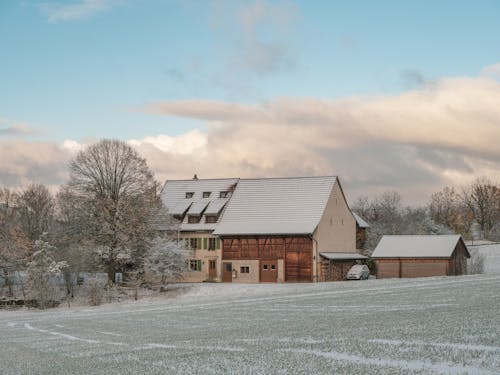 A House in the Countryside Covered in Snow 