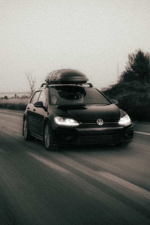 Black Volkswagen Golf on Road
