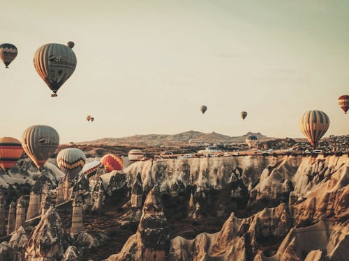 View of Hot Air Balloons Flying over Cappadocia, Turkey 