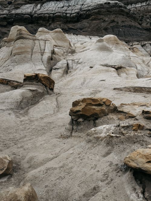 Free Intricate eroded rock formations in a remote, barren landscape showcasing natural beauty and geological history. Stock Photo