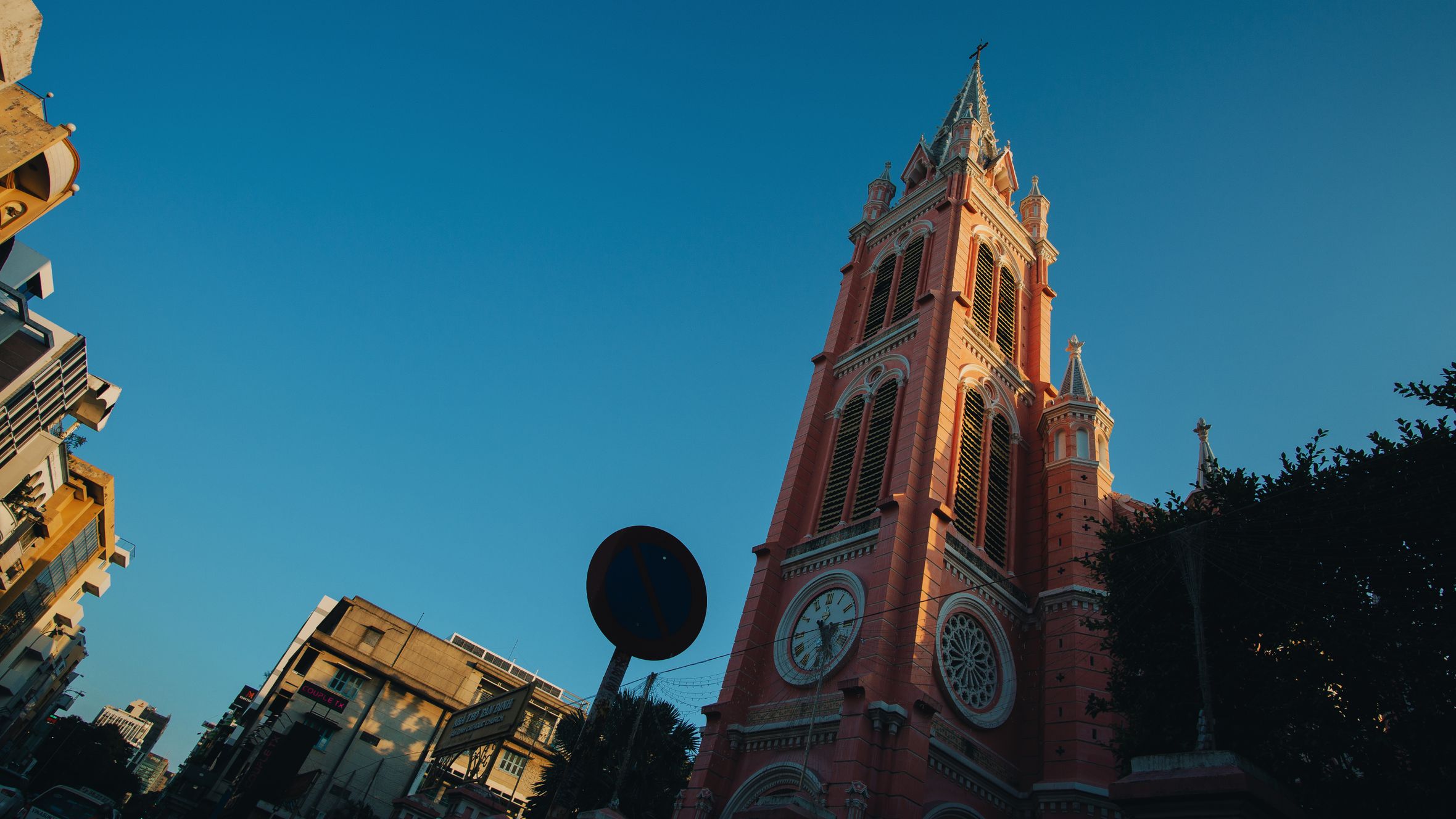 Capture of the iconic pink church tower in warm sunset light.