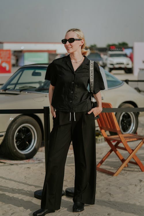 Woman in Black Shirt and Sunglasses