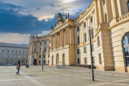 Free Baroque architecture at Bebelplatz in Berlin cityscape with a pedestrian and historic landmarks. Stock Photo