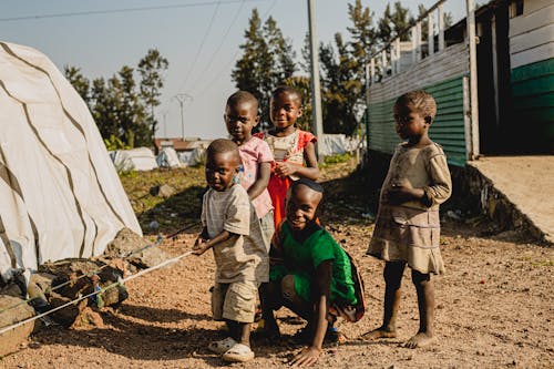 Smiling Boys in Village