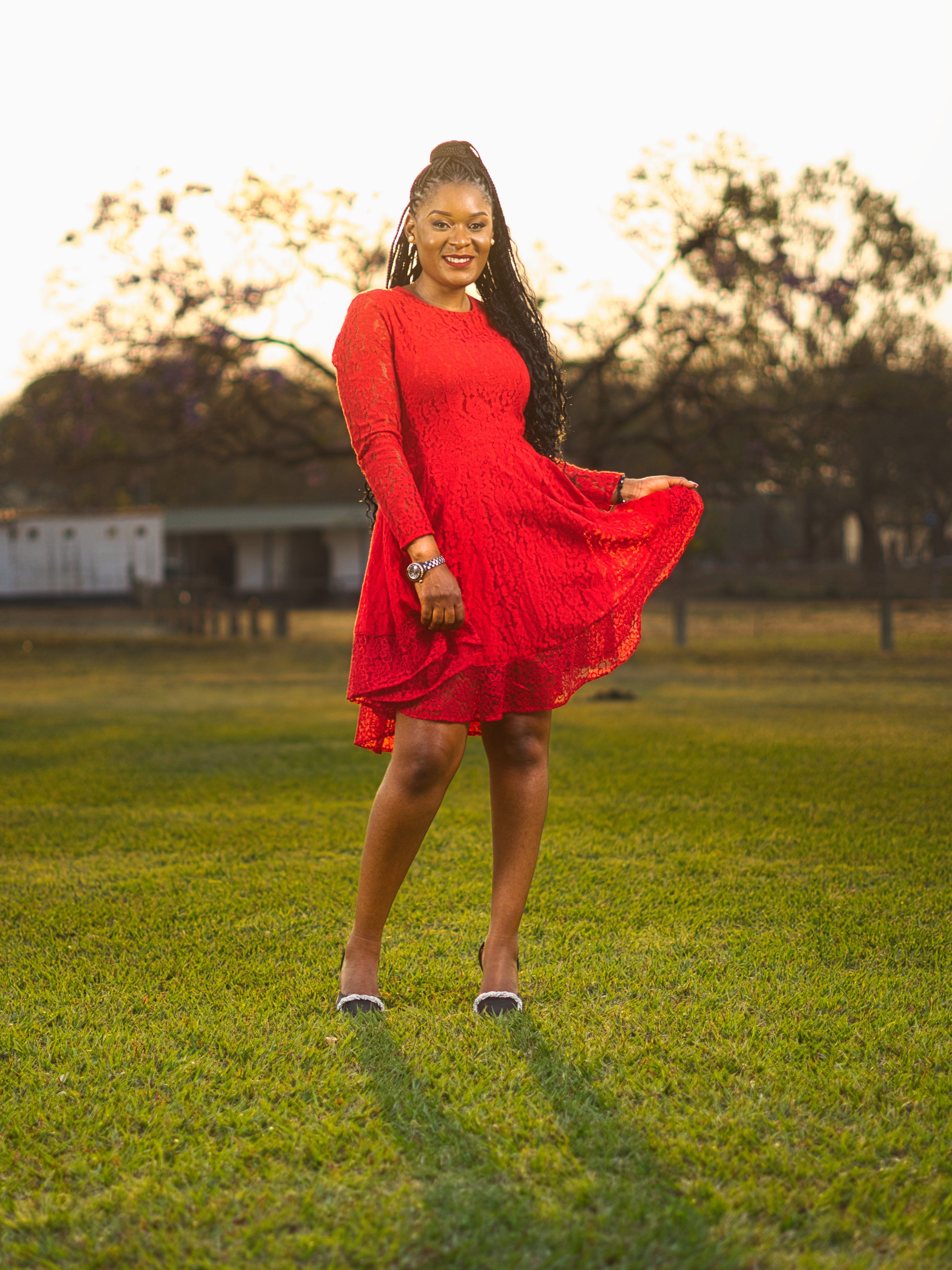 Woman in Red Dress Standing on Grass · Free Stock Photo