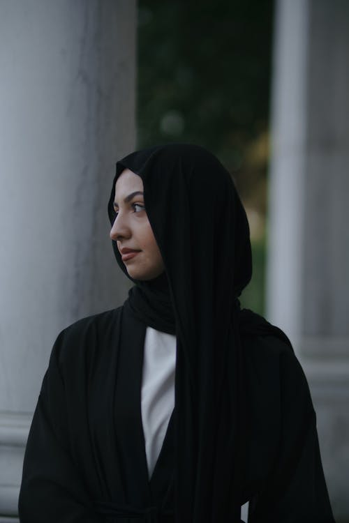 Young Woman Posing in Black Headscarf