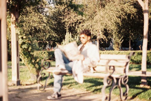 Man Sitting in a Park 