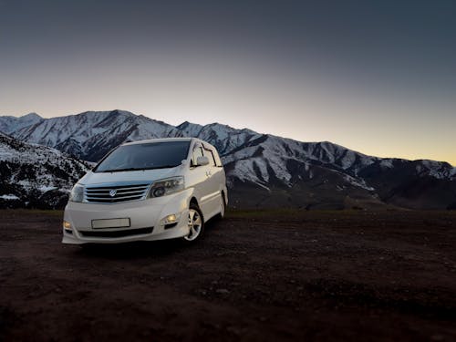 Toyota minivan on the background of mountains