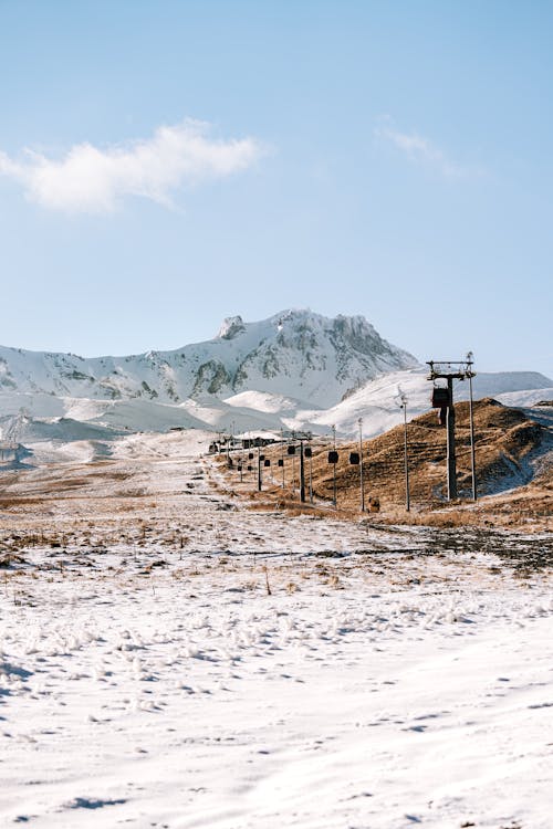 Gratis stockfoto met bergen, bergketen, besneeuwd