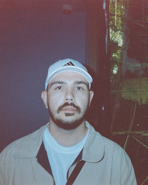 Man Wearing a Baseball Cap 