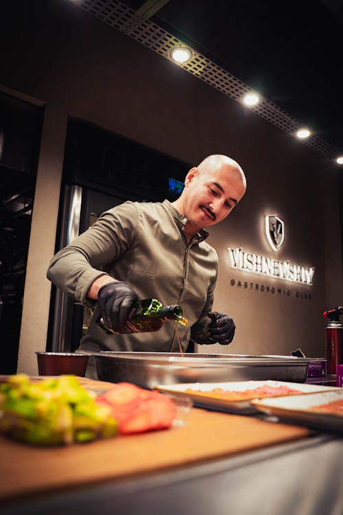 Free Man Working in a Kitchen  Stock Photo