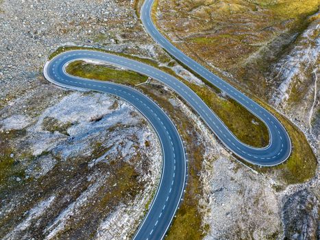 Scenic aerial view of a winding mountain road in Hochtor, Oberösterreich.
