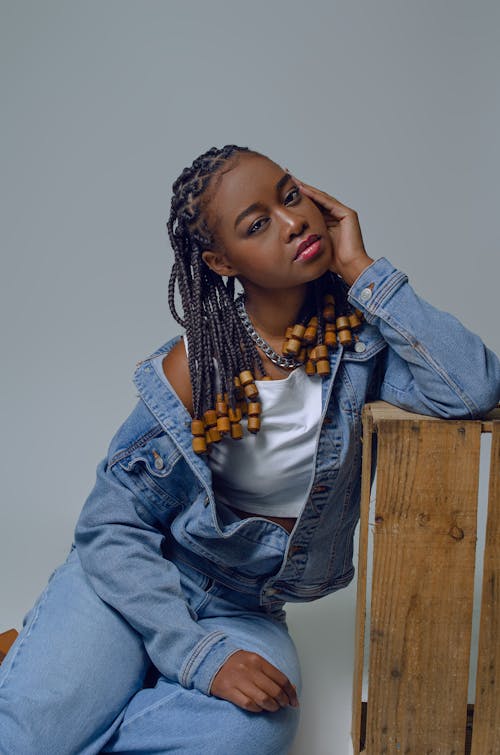 Portrait of Woman in Jean Jacket and with Braided Hair