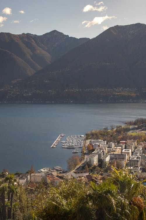 Town by Lake with Hill behind