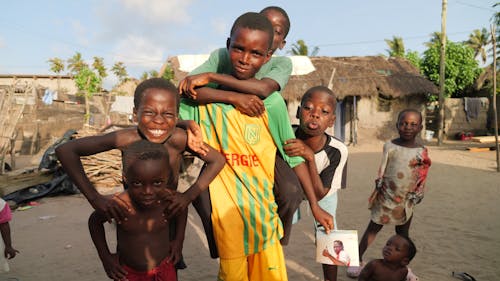 Photo of African Children Posing in a Village