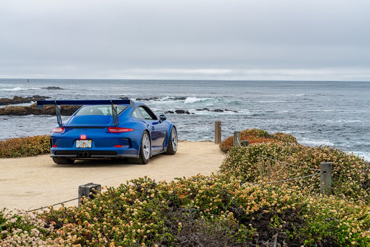 A Sports Car On A Sea Shore