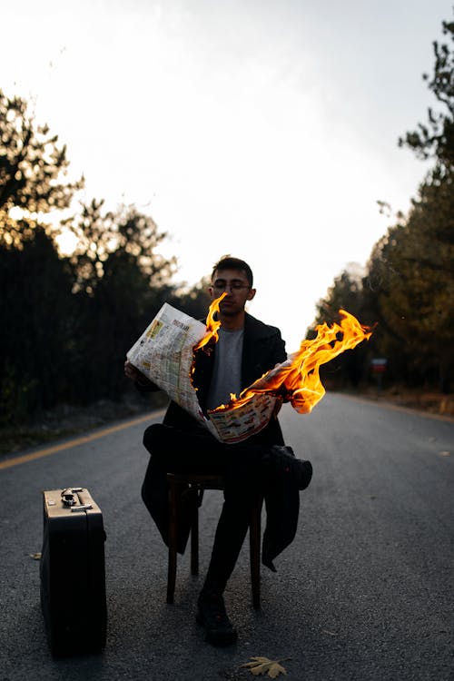 Man with Burning Newspaper 