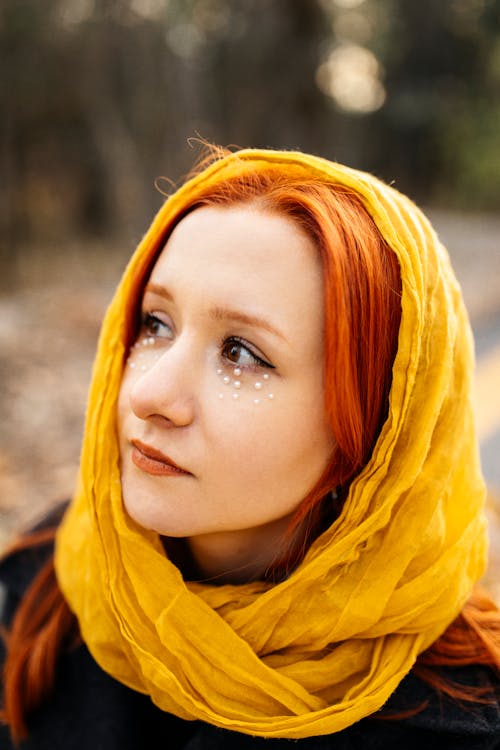 Portrait of Woman Wearing Yellow Headscarf 