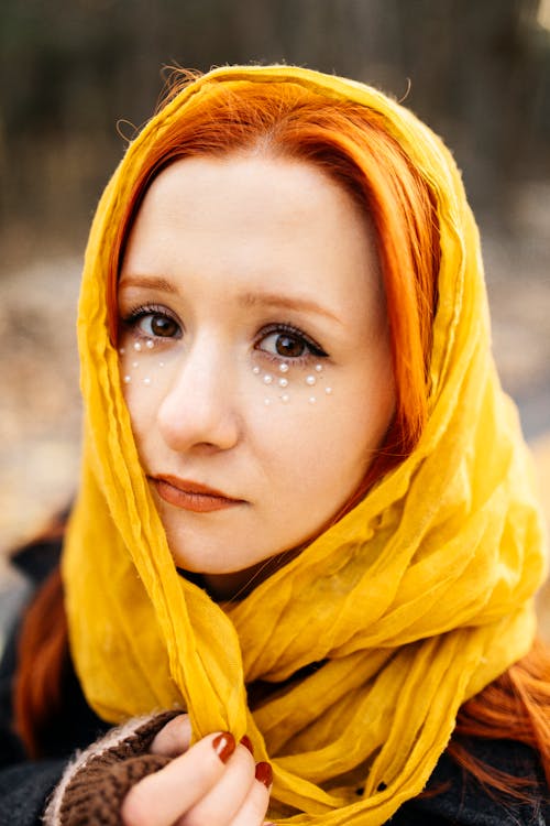 Model in Glamour Makeup Wearing Yellow Headscarf