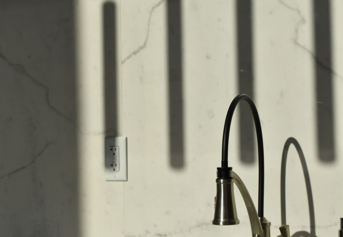 Modern kitchen sink with faucet and soap dispenser