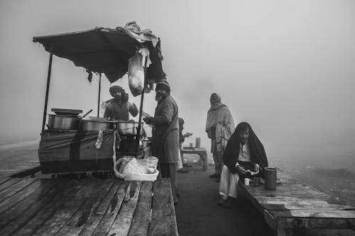 Group of Men on Foggy Surroundings