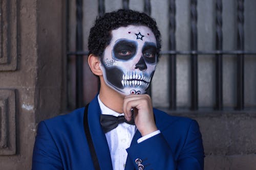 Man in Blue Suit and with Sugar Skull Makeup