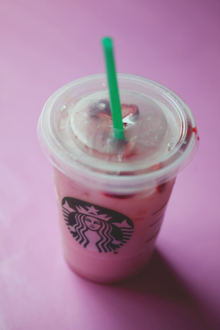 Delicious Healthy Berry Smoothie In Plastic Cup With Straw