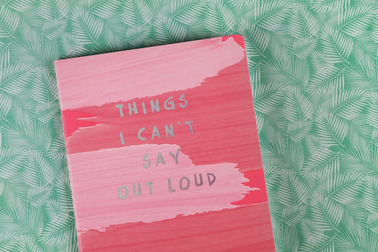 Things I Can't Say Out Load Book On Green Textile