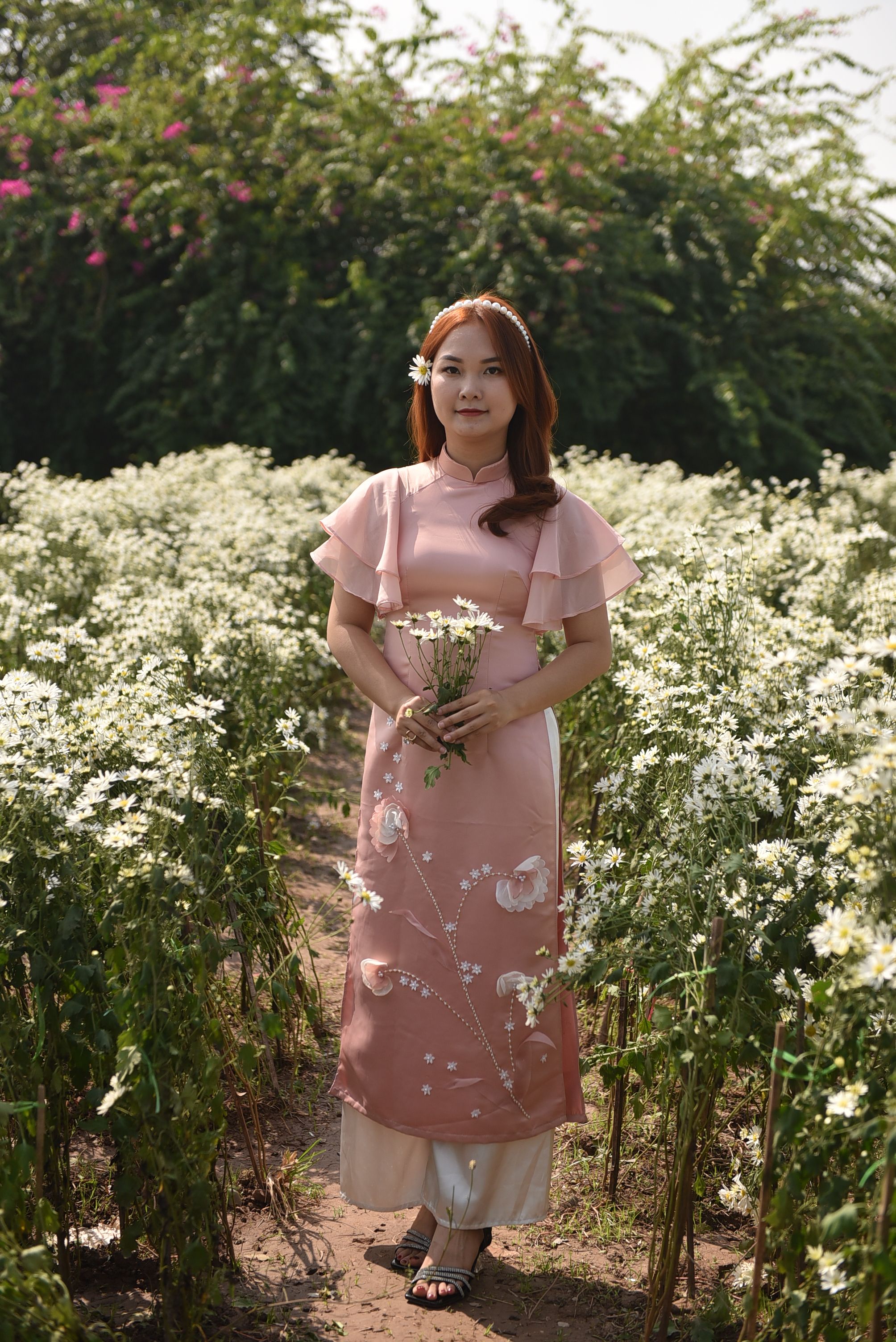 Woman in Pink Dress Standing with Flowers · Free Stock Photo