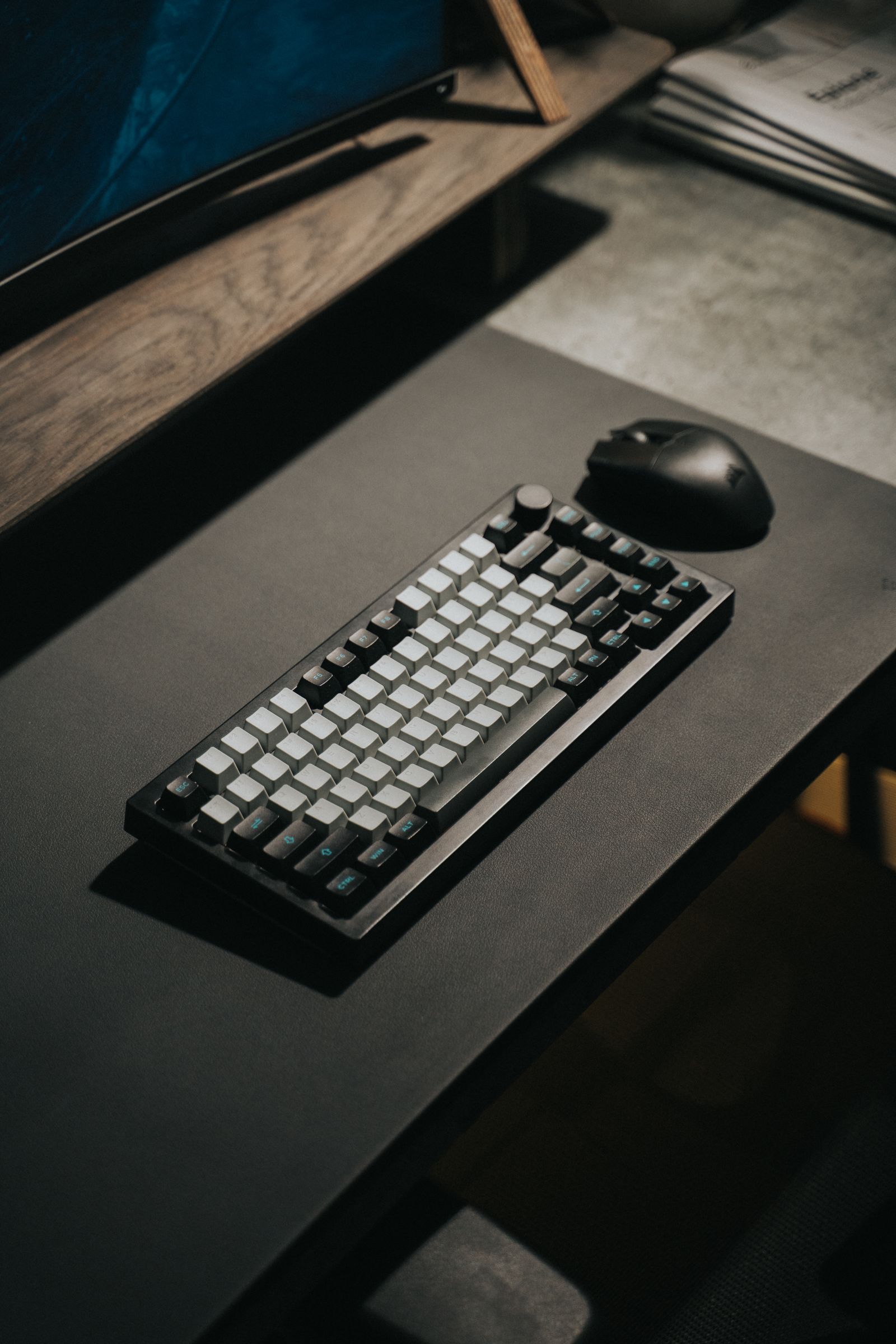 Wireless mouse and mechanical keyboard arranged on a clean modern desk
