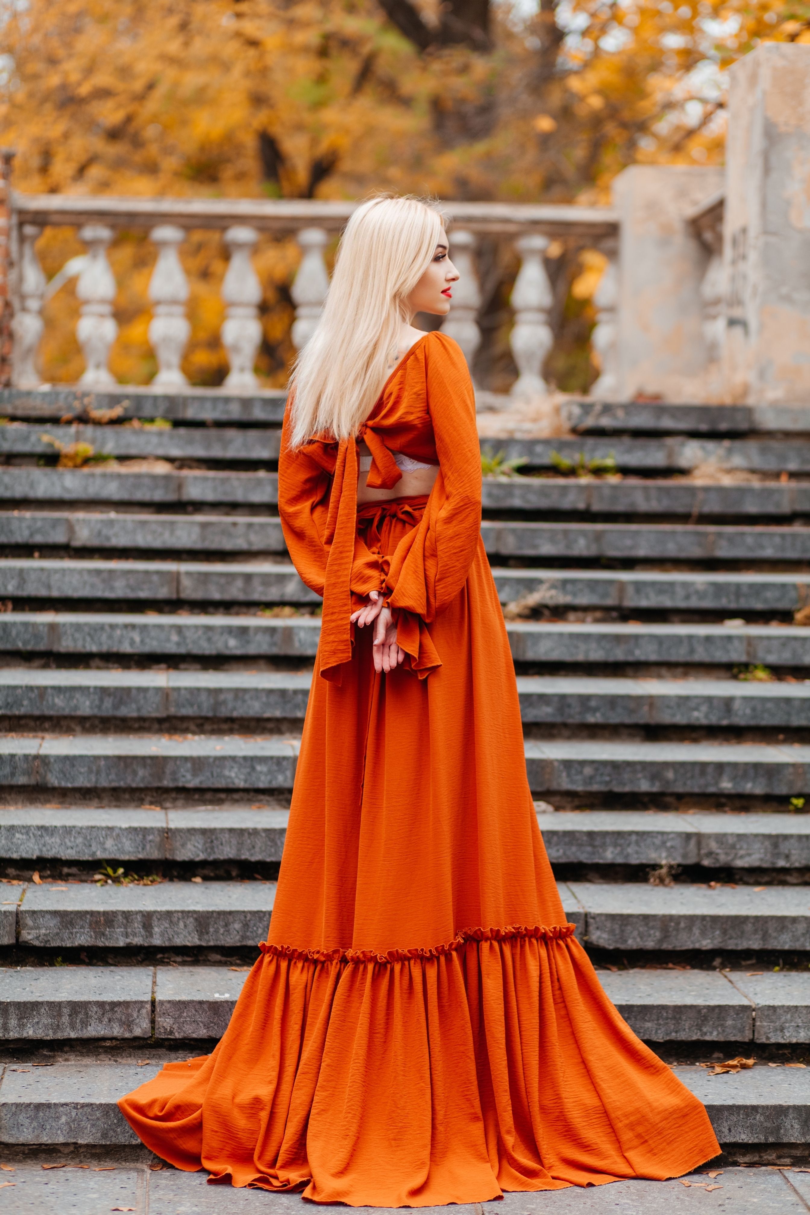 orange dress on pale skin Language of Colors: Use of Colors in Choosing an Invitation Dress