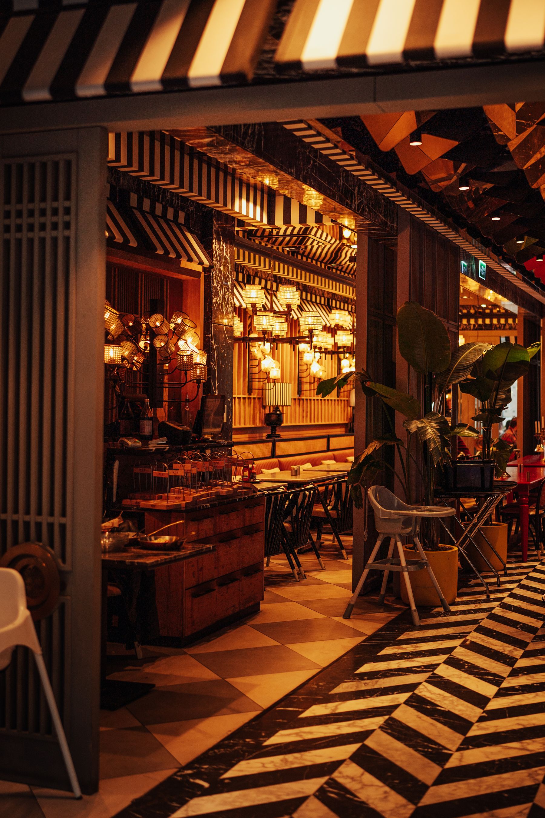 Warm restaurant interior arranged for comfortable dining