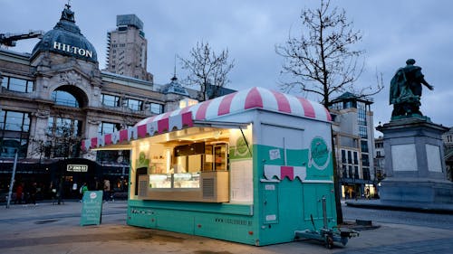 Food Stand near Ornamented Building in Town in Belgium