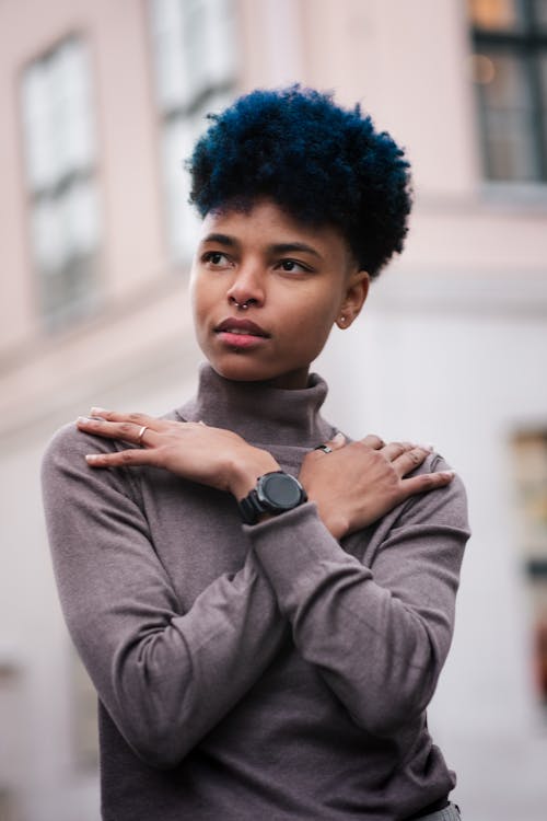 Portrait of Woman Standing with Arms Crossed